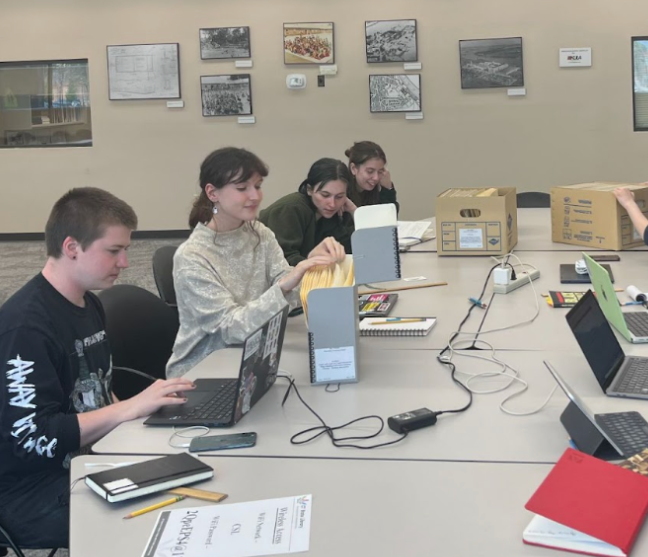 "Students reviewing Mansfield Training School documents, May 2023"